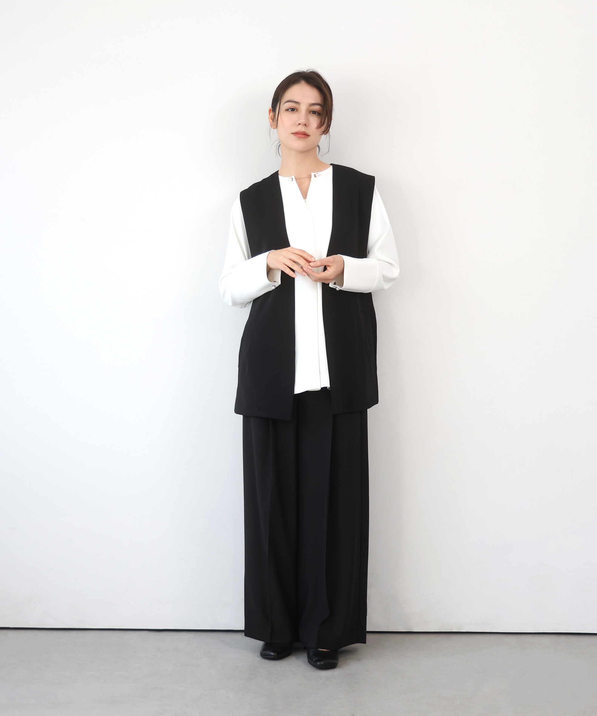 バックベルトボタンレスジレ