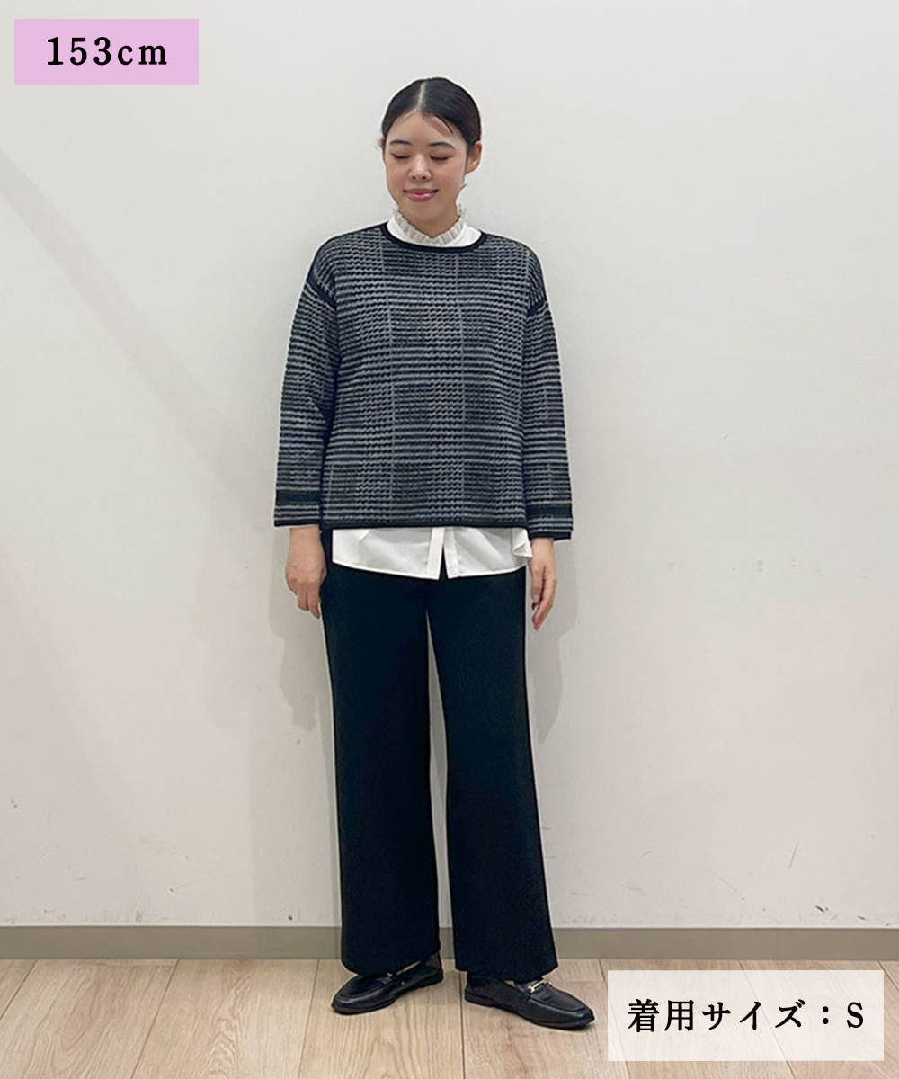 暖かみのあるチェック柄ニット