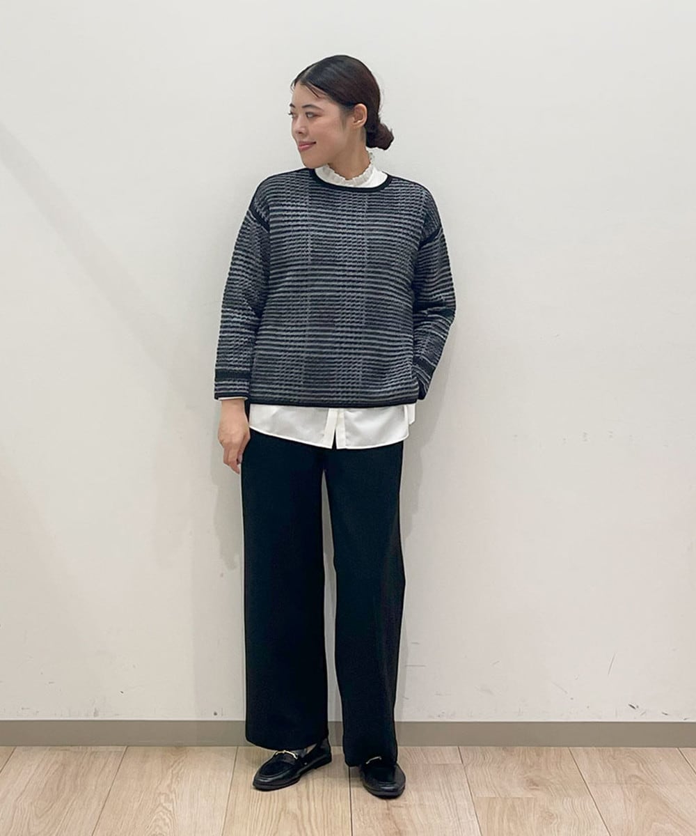 暖かみのあるチェック柄ニット