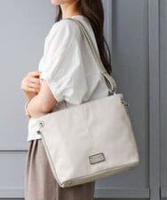 BKCGD09150 MK MICHEL KLEIN BAG(MK ミッシェルクラン バッグ) [2WAY]メタルタグアクセントショルダーバッグ アイボリー