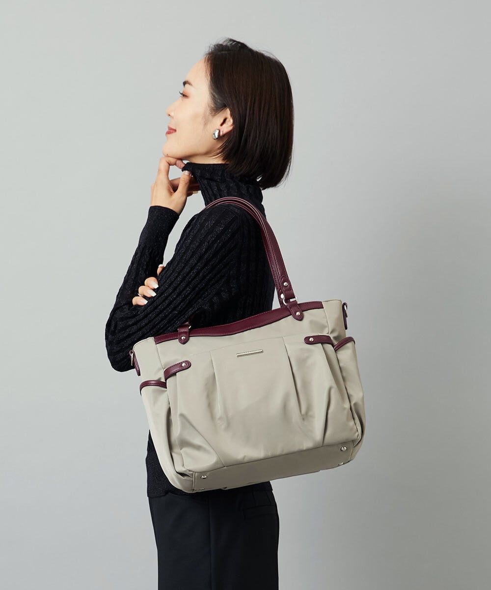 BKRAD31180 MK MICHEL KLEIN BAG [撥水/2WAY]サイドポケットパイピングバッグ