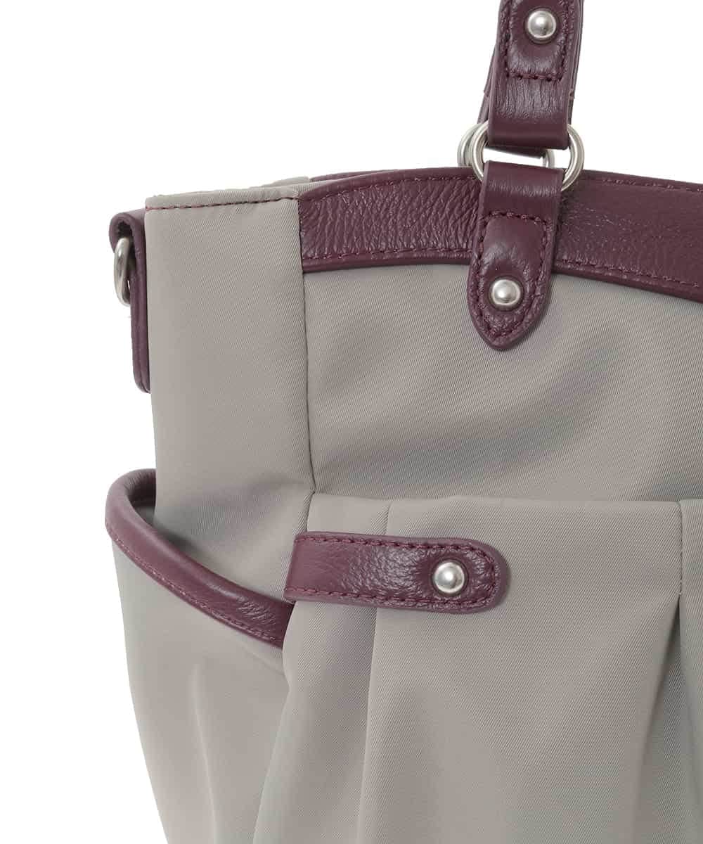 BKRAD31180 MK MICHEL KLEIN BAG(MK ミッシェルクラン バッグ) [撥水/2WAY]サイドポケットパイピングバッグ ベージュ×レッド