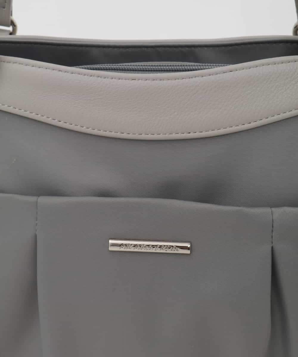 BKRAG31180 MK MICHEL KLEIN BAG(MK ミッシェルクラン バッグ) [2WAY/撥水/A4収納可]サイドポケットパイピングバッグ ブルーグレー×ライトグレー