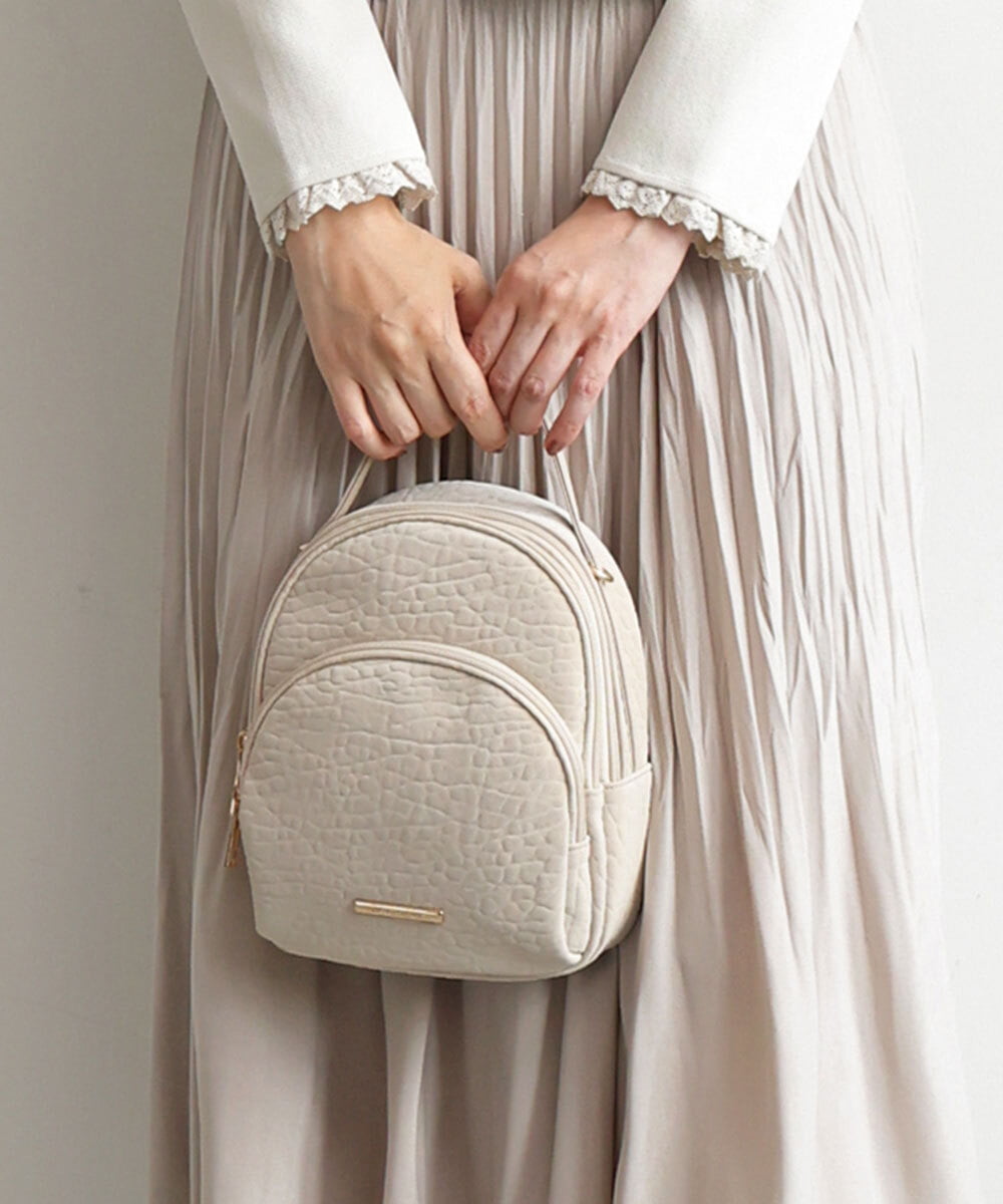 BPCLD94150 MK MICHEL KLEIN BAG(MK ミッシェルクラン バッグ) [3WAY/軽量]合成皮革ミニマムリュック アイボリー