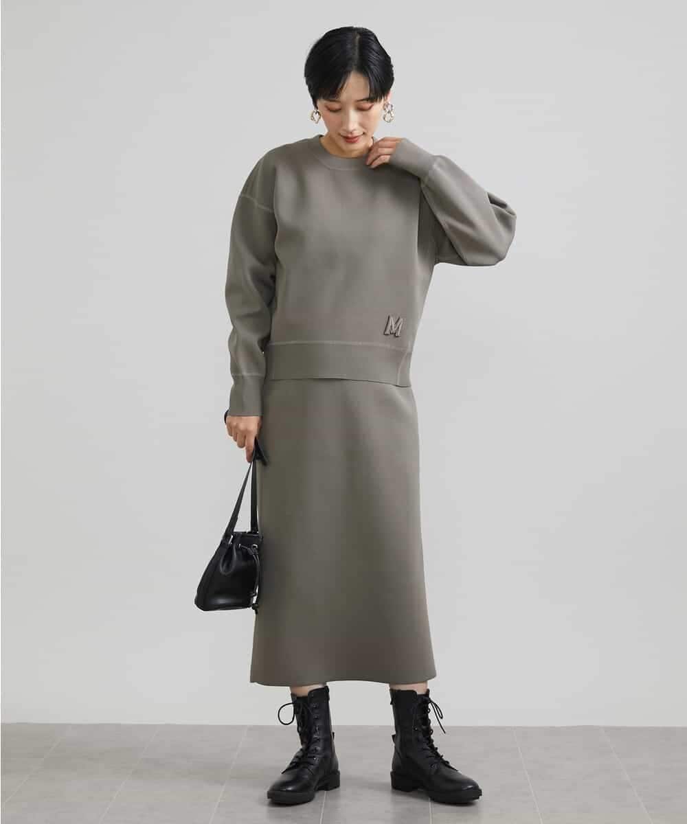 FMFAV37190 MICHEL KLEIN(ミッシェルクラン) スポンディッシュポリワッペン付きニット（セットアップ対応） ブラック(94)
