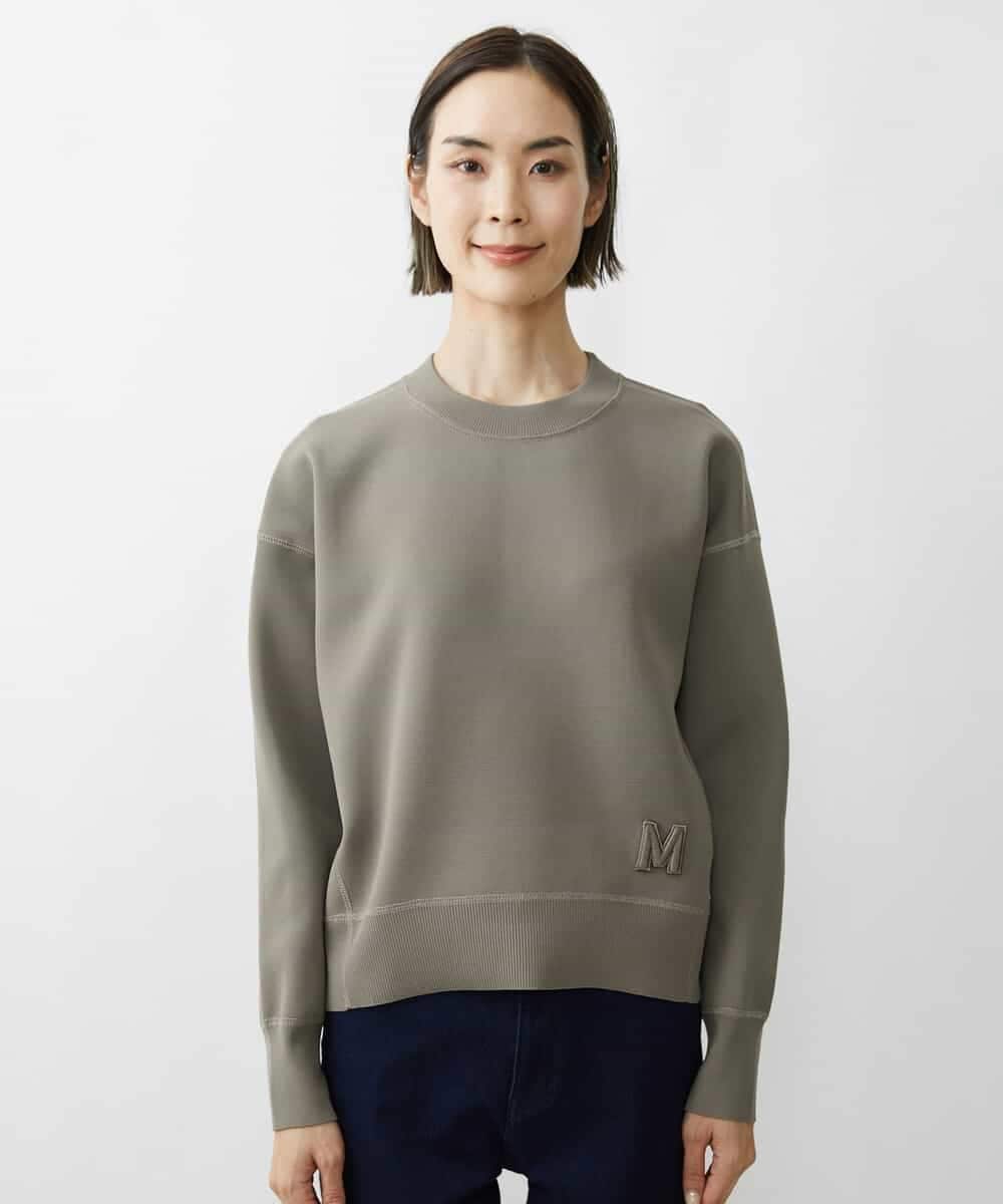 FMFAV37190 MICHEL KLEIN(ミッシェルクラン) スポンディッシュポリワッペン付きニット（セットアップ対応） ブラック(94)