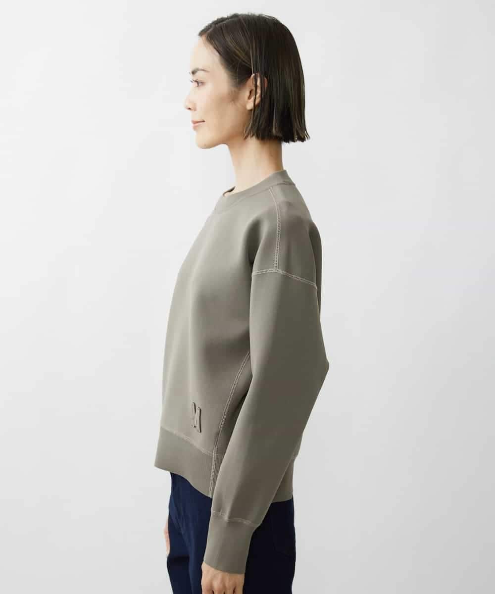 FMFAV37190 MICHEL KLEIN(ミッシェルクラン) スポンディッシュポリワッペン付きニット（セットアップ対応） ブラック(94)