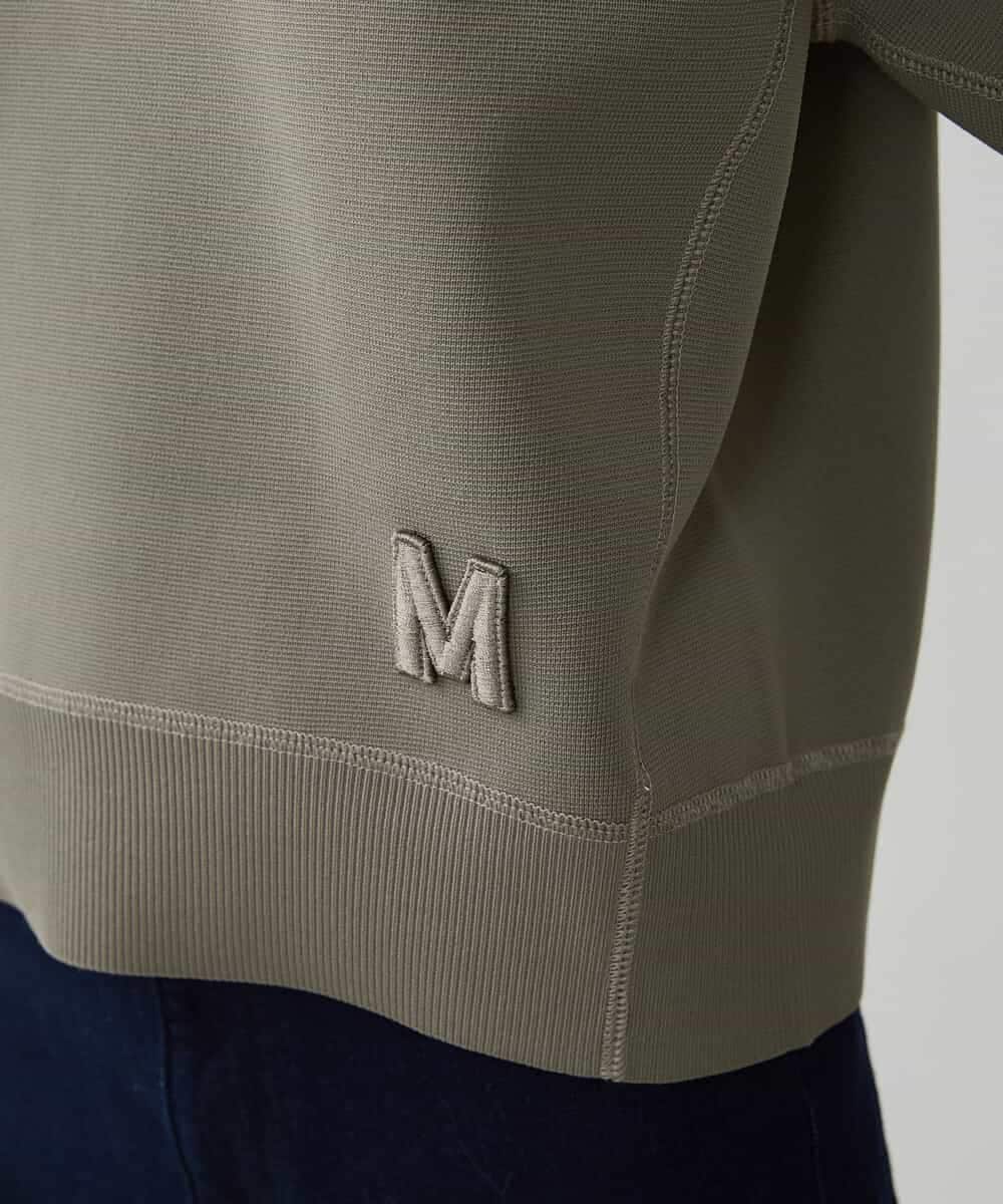 FMFAV37190 MICHEL KLEIN(ミッシェルクラン) スポンディッシュポリワッペン付きニット（セットアップ対応） ブラック(94)