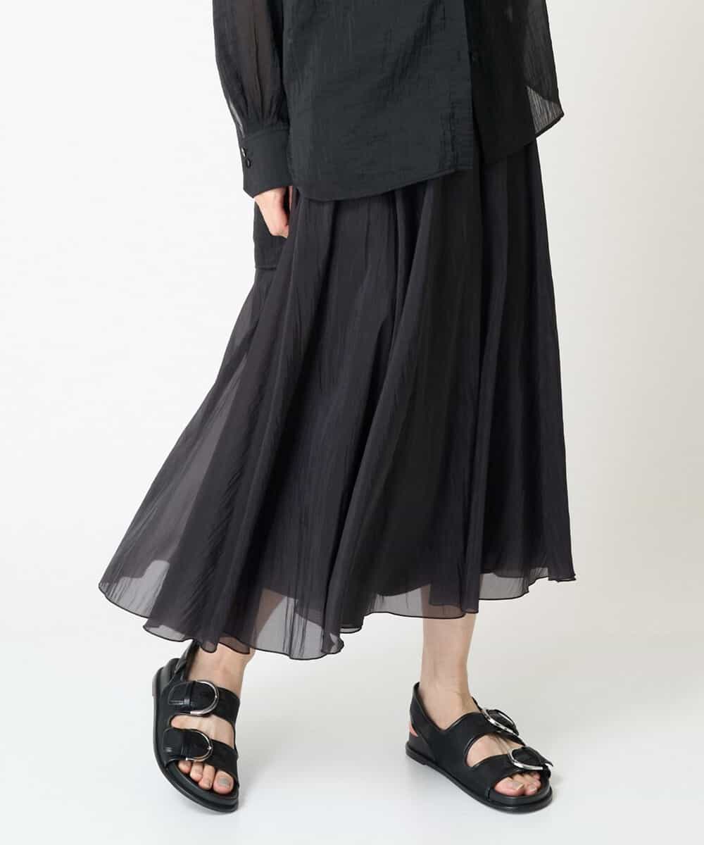 FMHGV47230 MICHEL KLEIN(ミッシェルクラン) [セットアップ対応］ナイロンシアーフレアスカート ブラック(94)