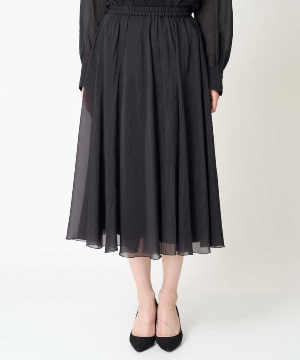 FMHGV47230 MICHEL KLEIN(ミッシェルクラン) [セットアップ対応］ナイロンシアーフレアスカート ブラック(94)