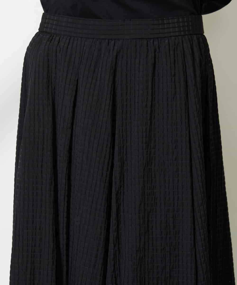 FMHJA05250 MICHEL KLEIN(ミッシェルクラン) [セットアップ対応]トリオシアーチェックフレアスカート ブラック