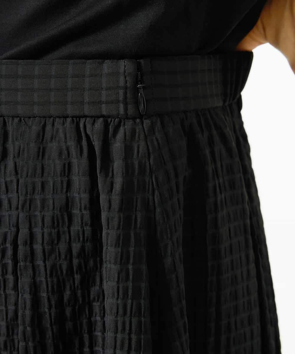 FMHJA05250 MICHEL KLEIN(ミッシェルクラン) [セットアップ対応]トリオシアーチェックフレアスカート ブラック