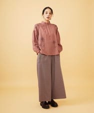 GJBAE40200 Jocomomola(ホコモモラ) Susurrito フラワーモチーフハイネックブラウス ブラック