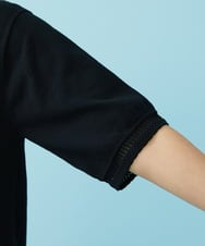 GJFHS30160 Jocomomola(ホコモモラ) ハイツイストコットン ブローチ付きニットプルオーバー ブラック