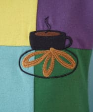 GJKJV01170 Jocomomola(ホコモモラ) CHURROS 刺繍入り配色パッチワークTシャツ ライトブルー