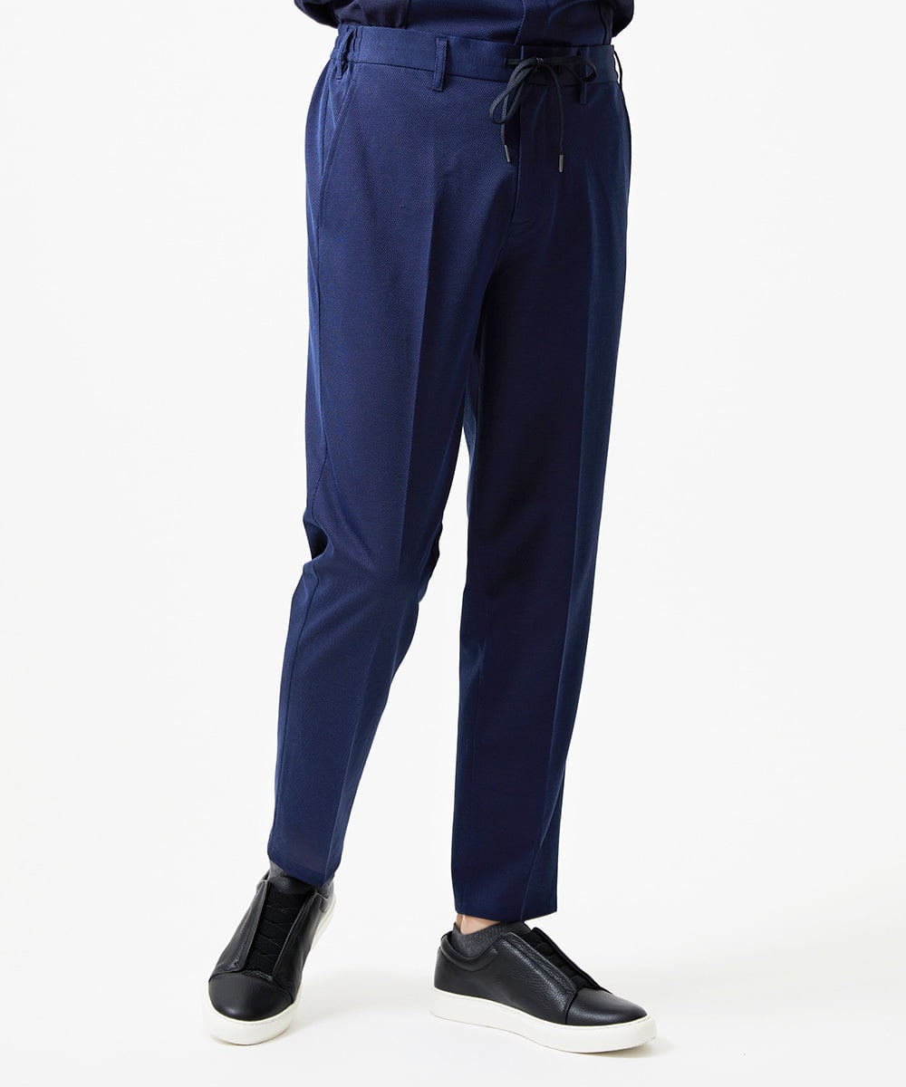 MNHJD63250 MICHEL KLEIN HOMME(ミッシェルクラン オム) 【セットアップ】9分丈ジャージースラックスパンツ ブルー