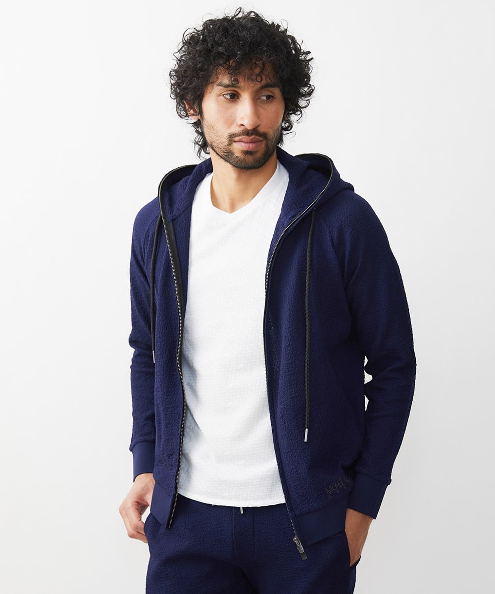MNKGX68250 MICHEL KLEIN HOMME(ミッシェルクラン オム) ブランドロゴ刺繍入りニットパーカー セットアップ ネイビー