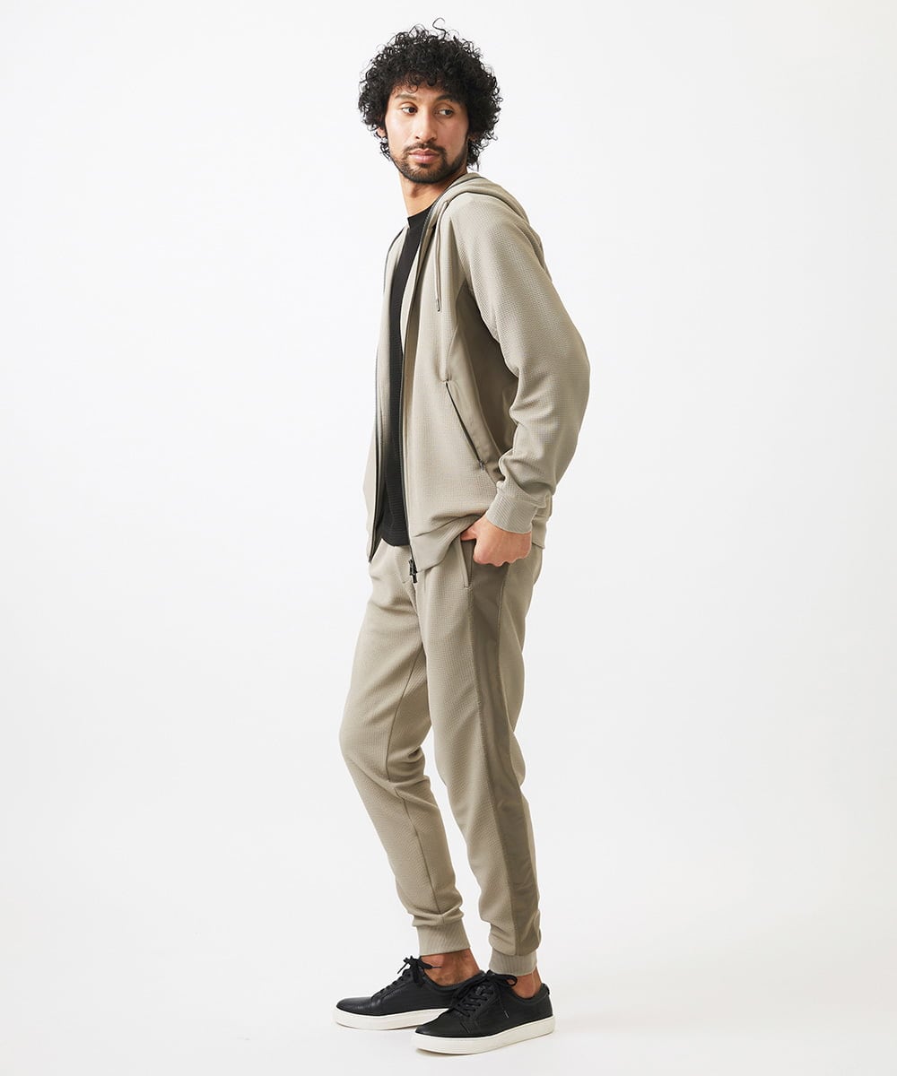 MNLGC58230 MICHEL KLEIN HOMME(ミッシェルクラン オム) ダブルフェイスジョガーパンツ セットアップ オフホワイト