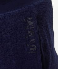 MNLGX59210 MICHEL KLEIN HOMME(ミッシェルクラン オム) ブランドロゴ刺繍入りニットパンツ セットアップ ネイビー