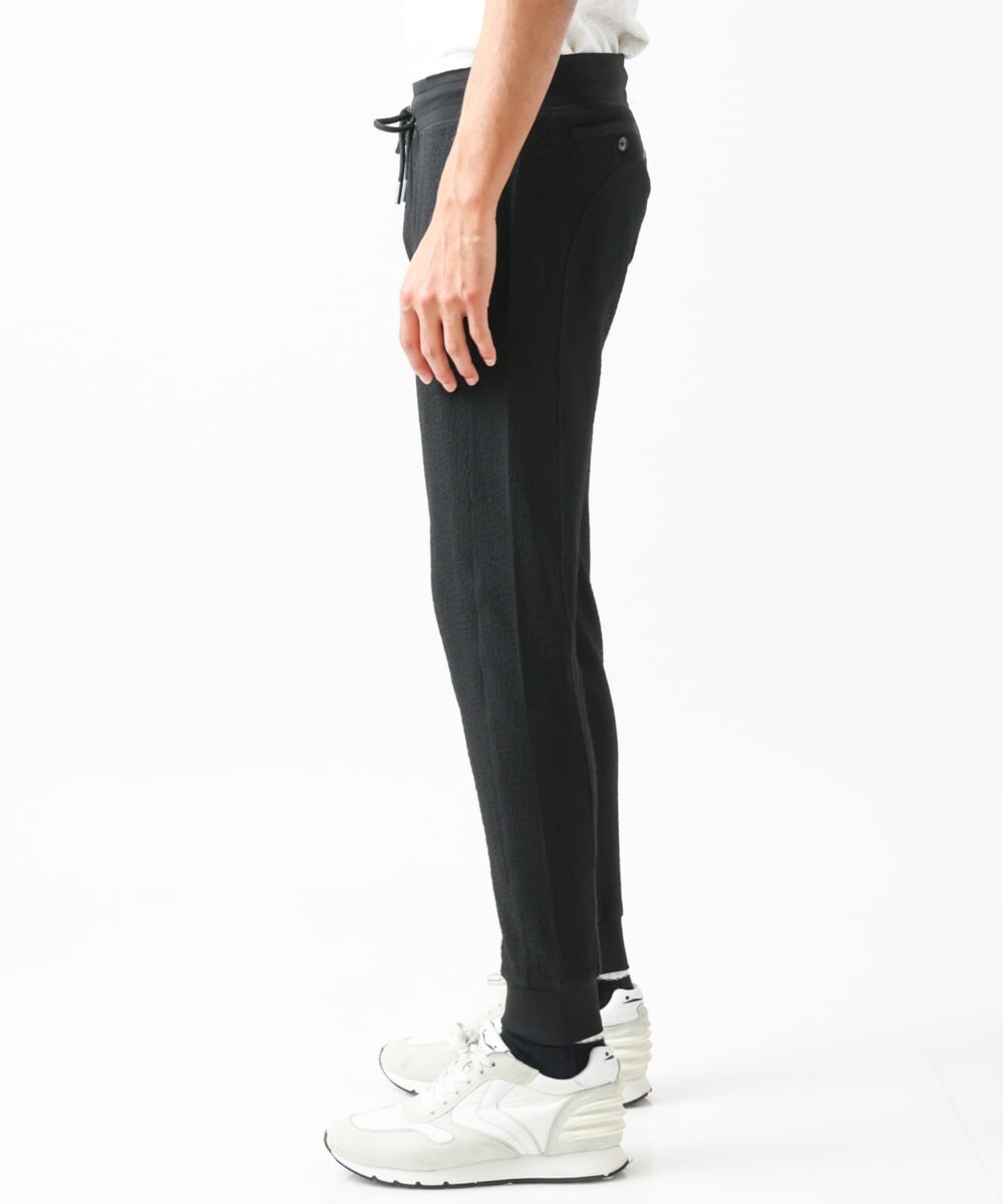 MNLGX59210 MICHEL KLEIN HOMME(ミッシェルクラン オム) ブランドロゴ刺繍入りニットパンツ セットアップ ブラック