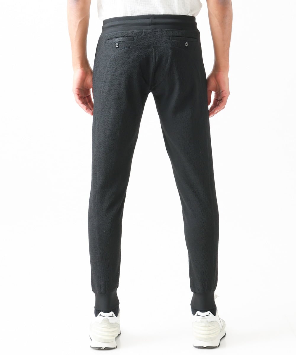 MNLGX59210 MICHEL KLEIN HOMME(ミッシェルクラン オム) ブランドロゴ刺繍入りニットパンツ セットアップ ブラック