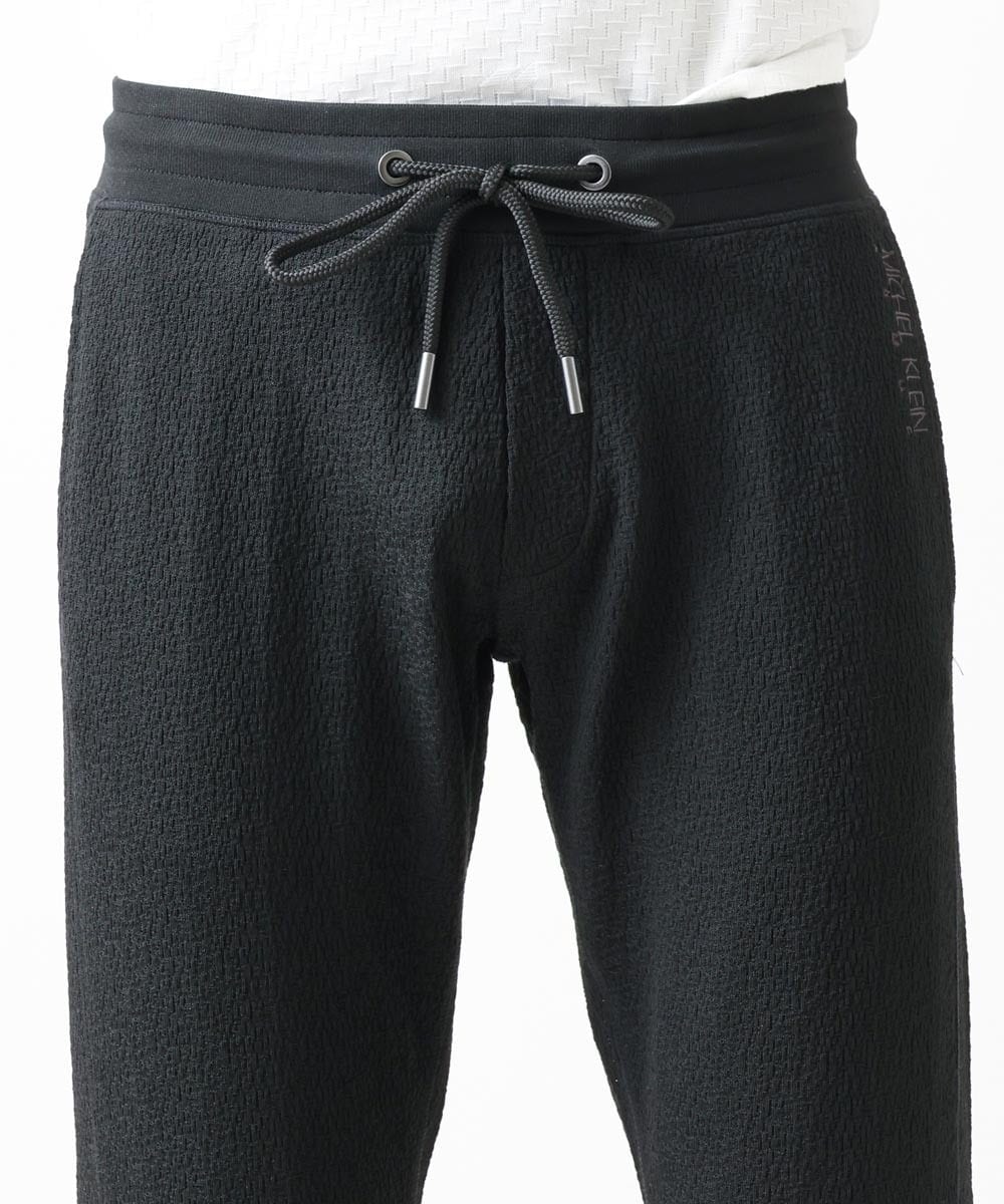 MNLGX59210 MICHEL KLEIN HOMME(ミッシェルクラン オム) ブランドロゴ刺繍入りニットパンツ セットアップ ブラック