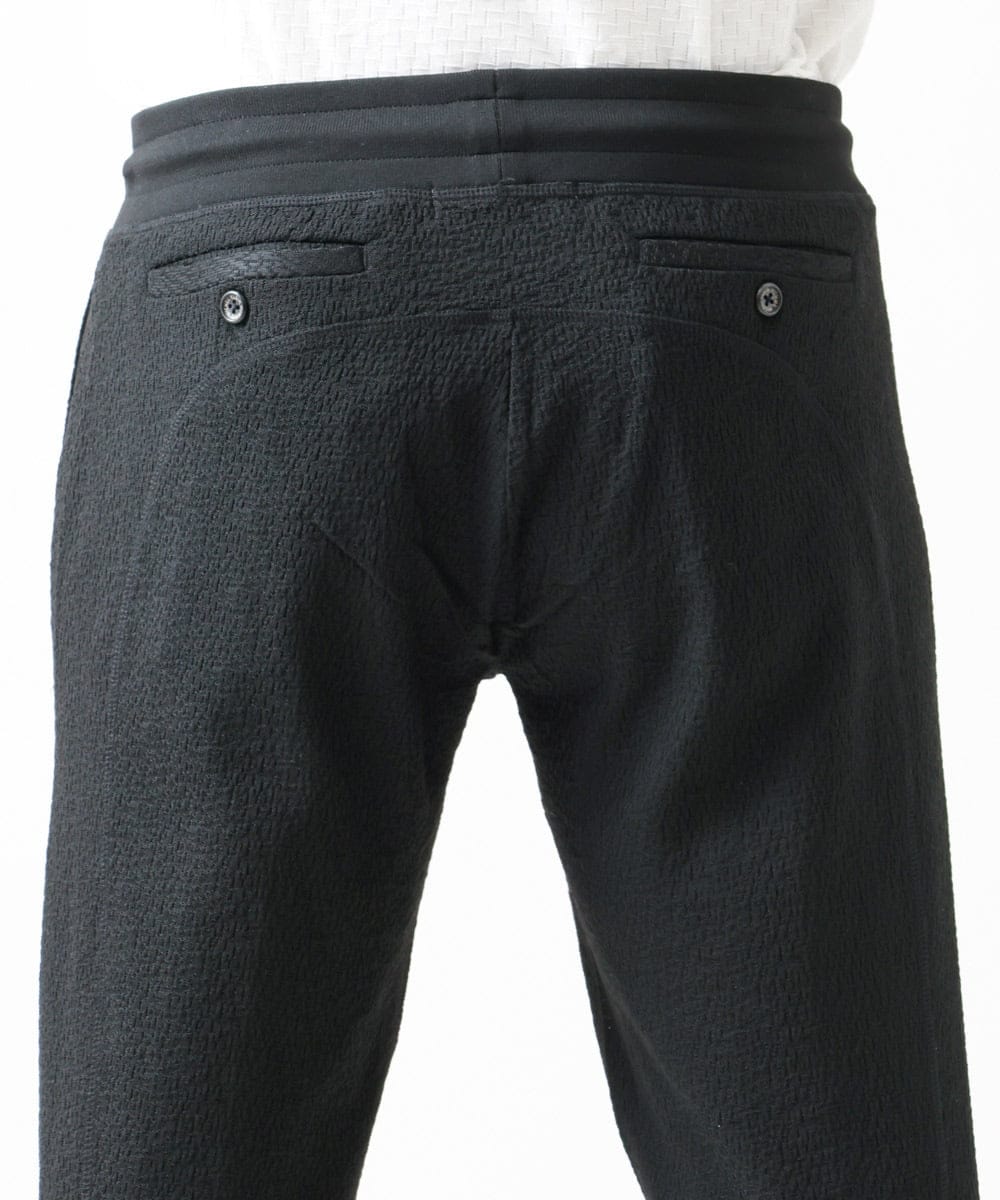 MNLGX59210 MICHEL KLEIN HOMME(ミッシェルクラン オム) ブランドロゴ刺繍入りニットパンツ セットアップ ブラック