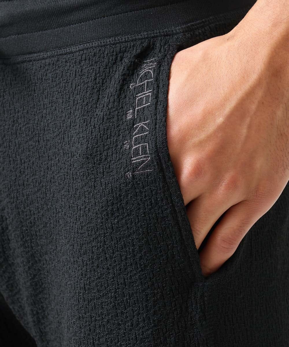 MNLGX59210 MICHEL KLEIN HOMME(ミッシェルクラン オム) ブランドロゴ刺繍入りニットパンツ セットアップ ブラック
