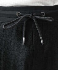 MNLGX59210 MICHEL KLEIN HOMME(ミッシェルクラン オム) ブランドロゴ刺繍入りニットパンツ セットアップ ブラック