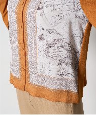 PRSAD32490 CHRISTIAN AUJARD(クリスチャン・オジャール) [アンサンブル対応]アートプリントドッキングニットカーディガン ベージュ×オレンジ