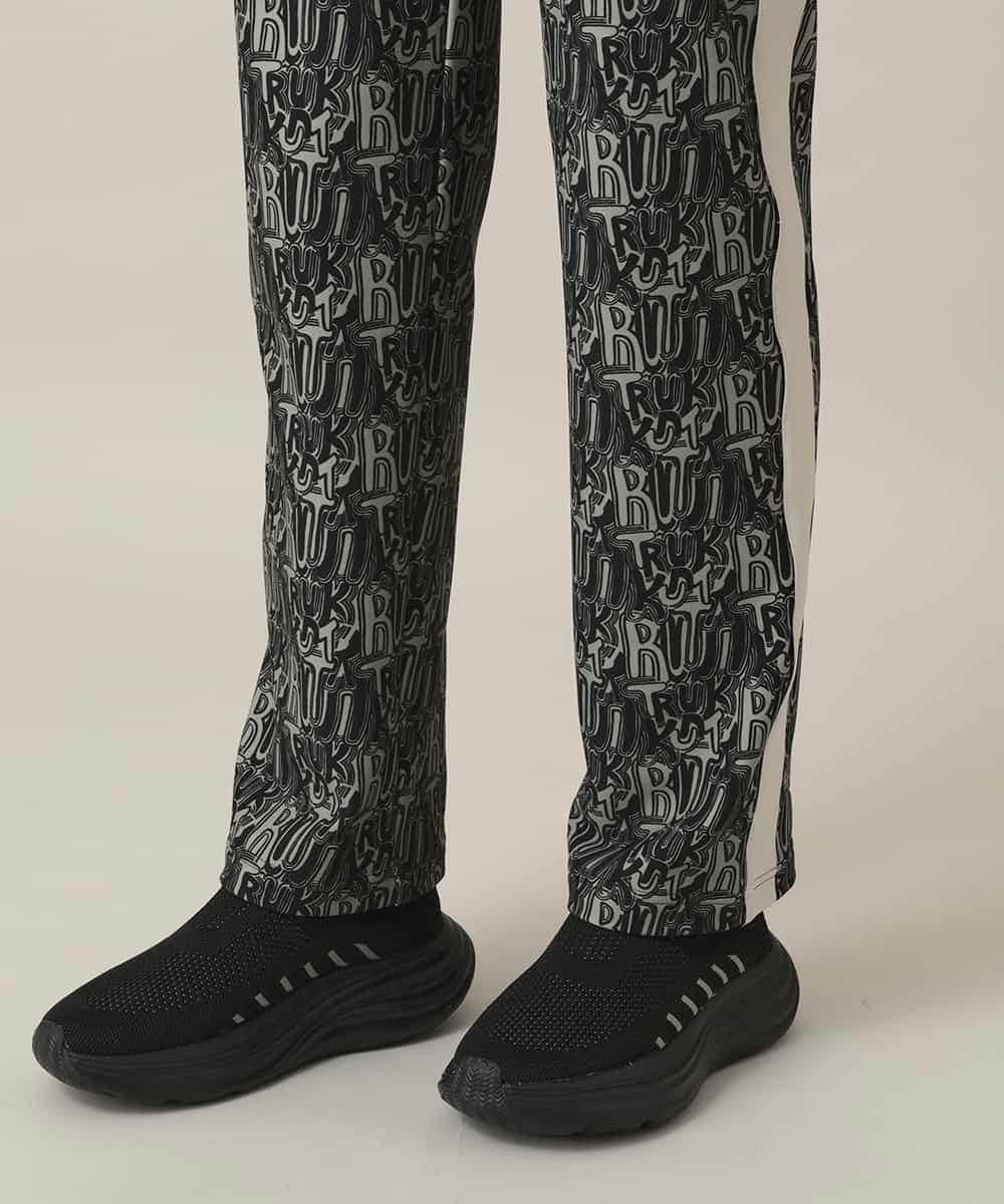 RSLED11490 TRUNK HIROKO KOSHINO(ヒロココシノ) サイドラインロゴプリントパンツ/洗える ブラック