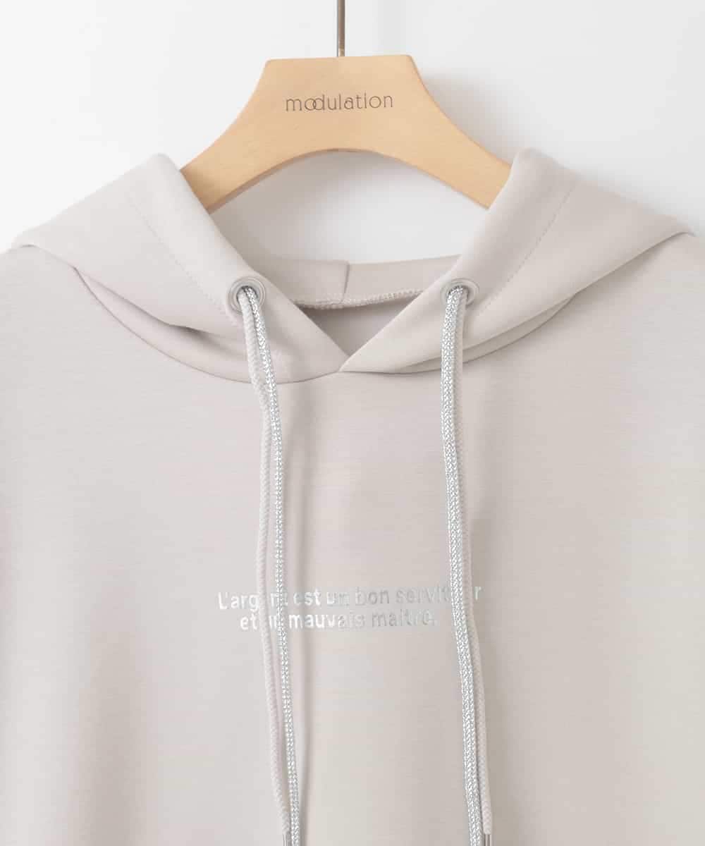 ZMKEE07128 al'aise modulation(アレーズモジュレーション) 箔ロゴラメコードフーディー ベージュ