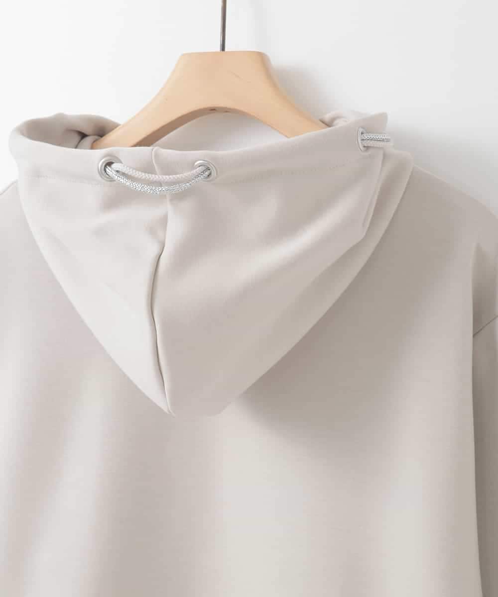 ZMKEE07128 al'aise modulation(アレーズモジュレーション) 箔ロゴラメコードフーディー ベージュ